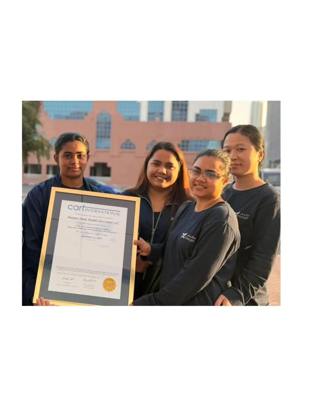 Enayati staff with CARF international accreditation